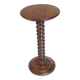 Wooden pedestal table with spiked columns