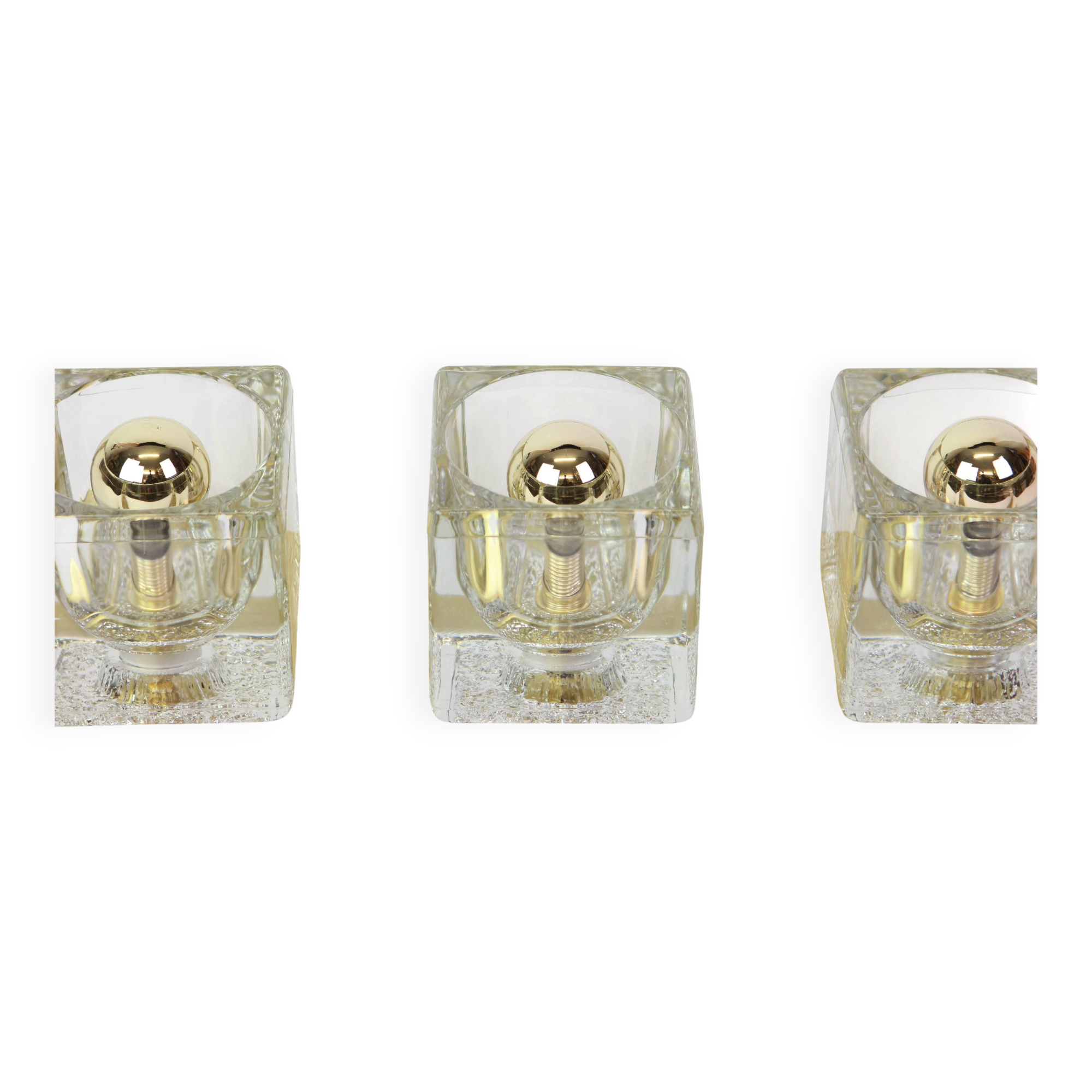 Exclusive wall sconces in crystal and brass by Peill & Putzler, Germany.