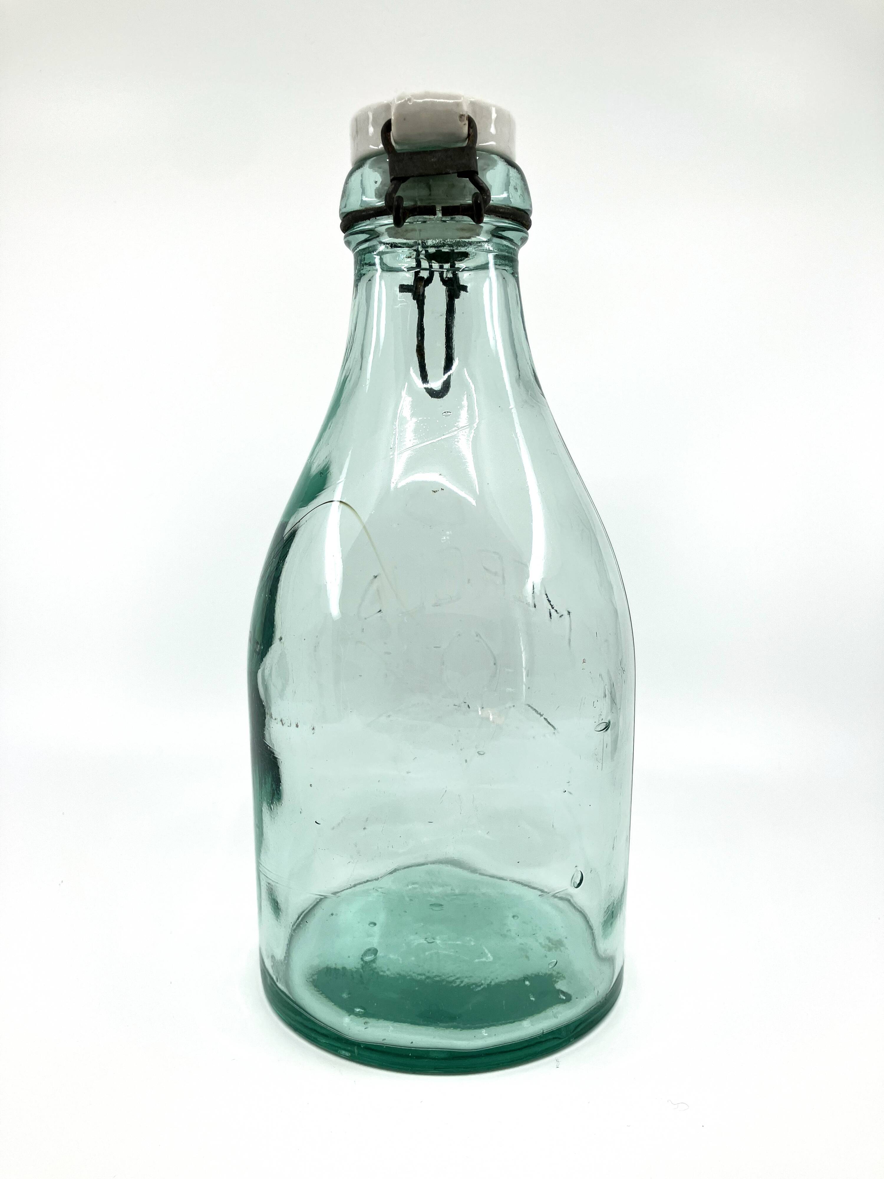 Large "Mercur" glass bottle with ceramic stopper • 2L • 1930