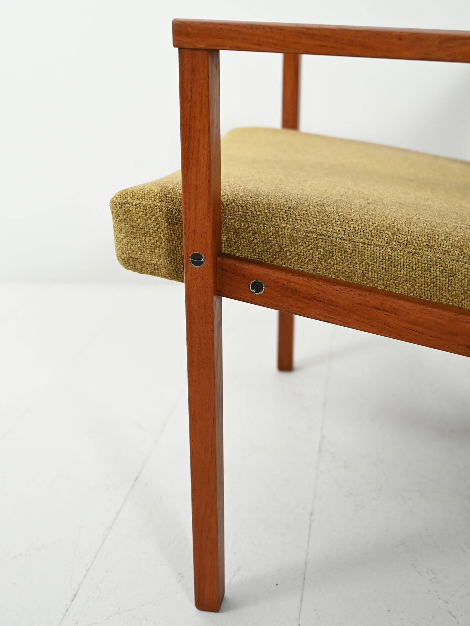 Pair of Danish teak armchairs with green upholstery