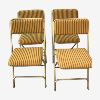 Set de 4  chaises pliantes en laiton et velours moutarde à rayures signé «  Lafuma » 1960