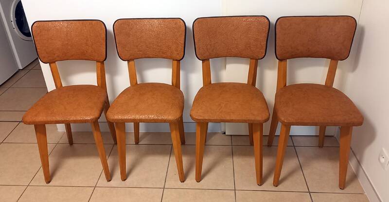 Set of 4 vintage chairs in solid beech and caramel faux leather.