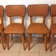 Set of 4 vintage chairs in solid beech and caramel faux leather.