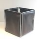 Chrome and faux leather wastepaper basket