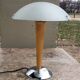 Table lamp legs chrome wood lampshade opaque glass.