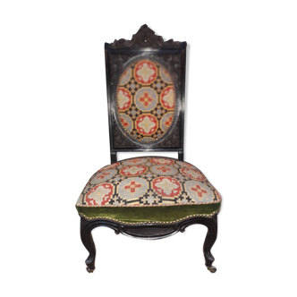 Blackened wooden chair