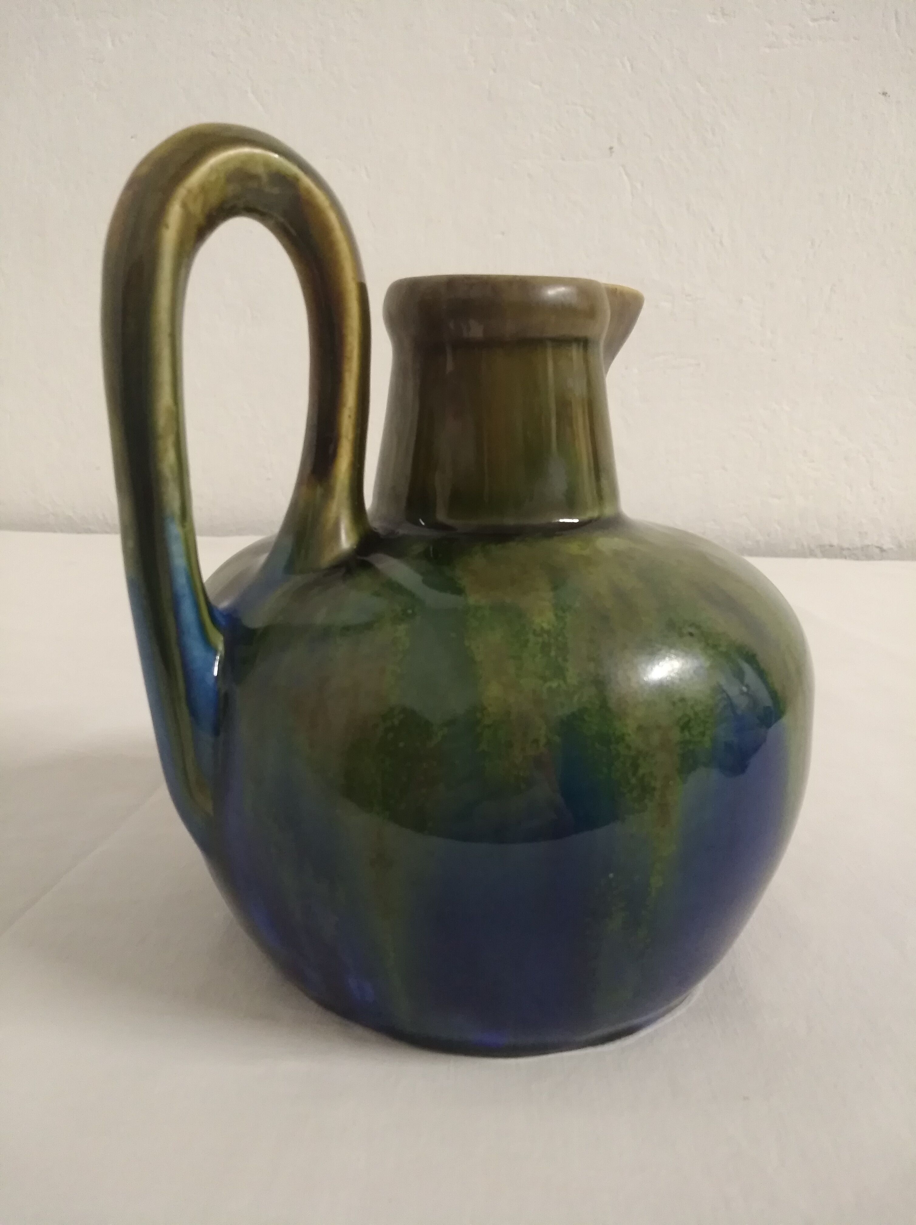 Flamed ceramic pitcher