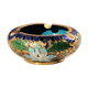 Ashtray floral floral ornament, plant in relief on a golden background.