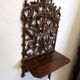 Étagère murale en bois sculpté