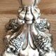 Paire de bougeoirs flambeaux en argent massif poinçon licorne, début XIXème