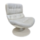 Fauteuil pivotant en cuir patiné gris