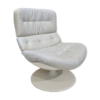 Swivel armchair in grey patinated leather
