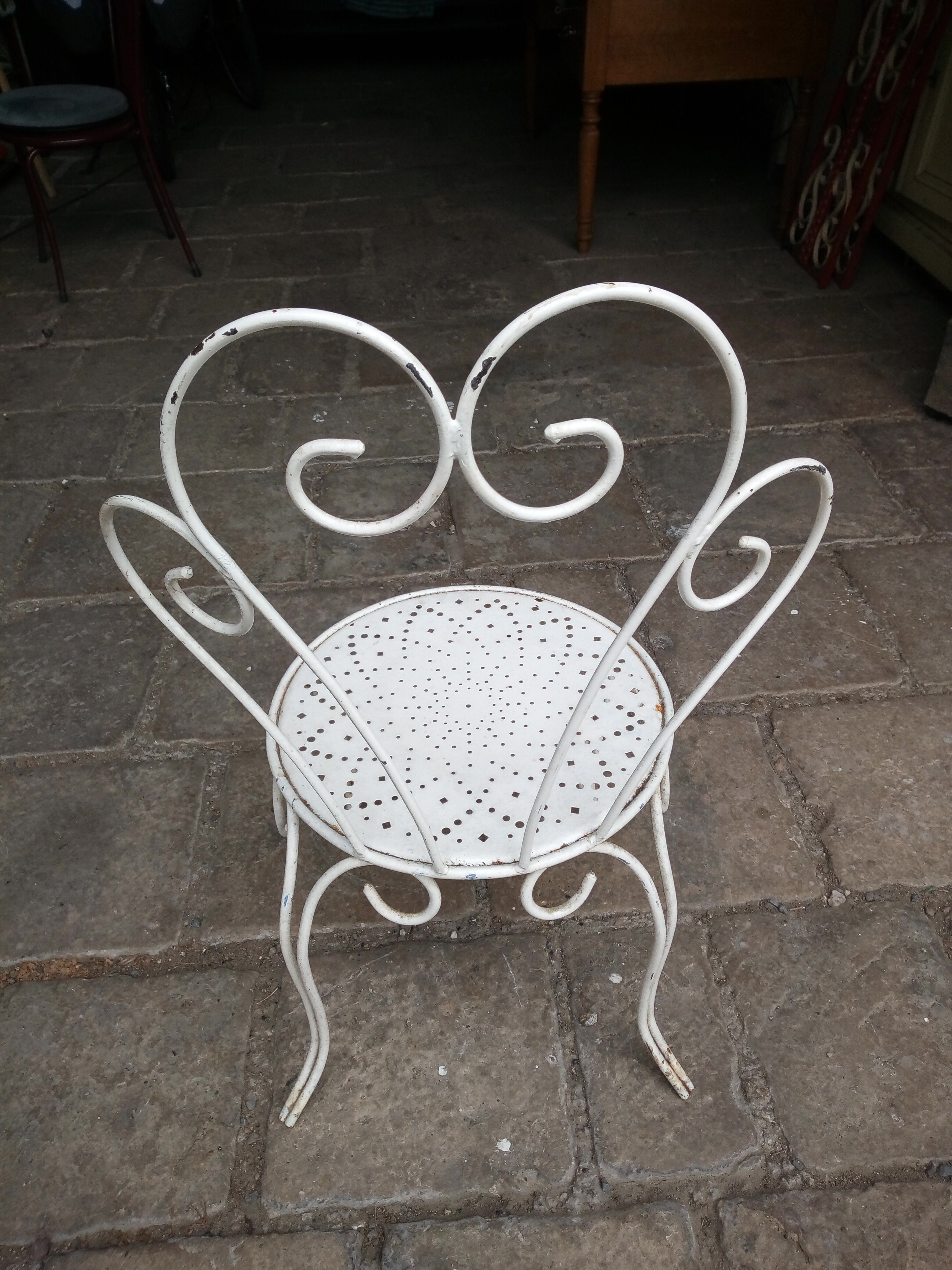 Chaise de jardin en fer forgé