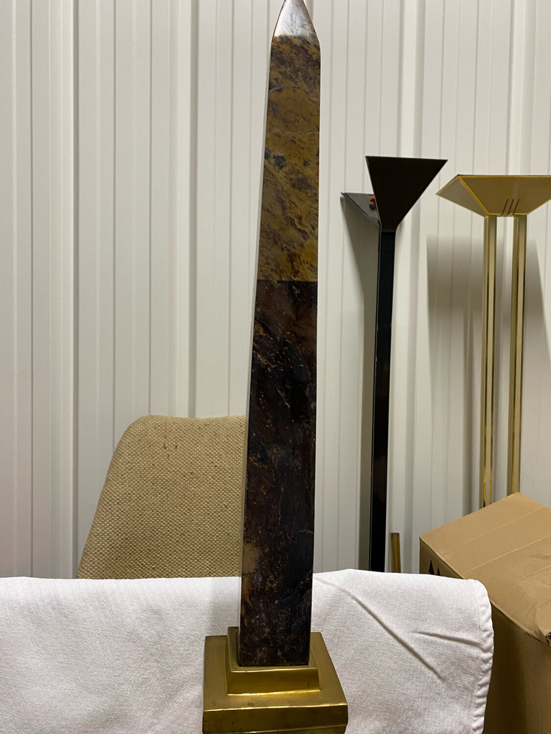 Obelisk stone brass base