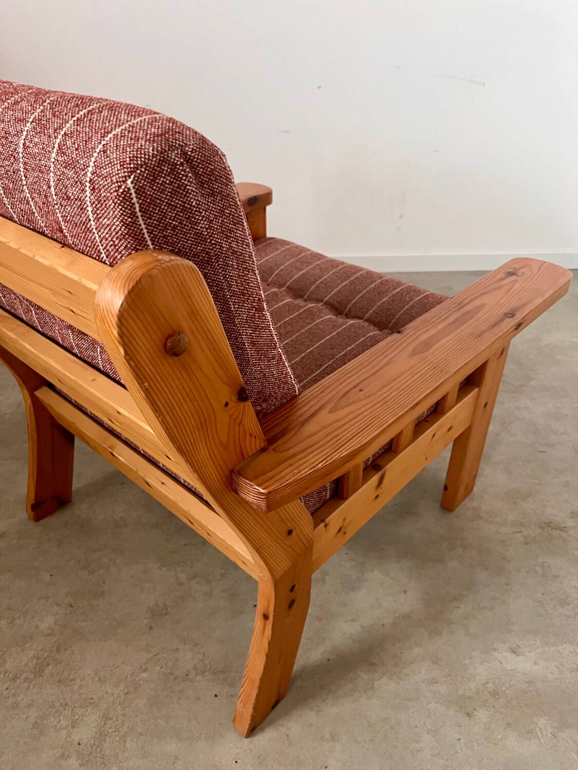 Old vintage Scandinavian design pine armchair from the 70s