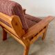 Old vintage Scandinavian design pine armchair from the 70s