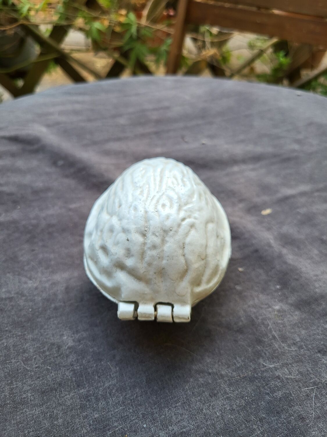 Vintage cast iron nut crate