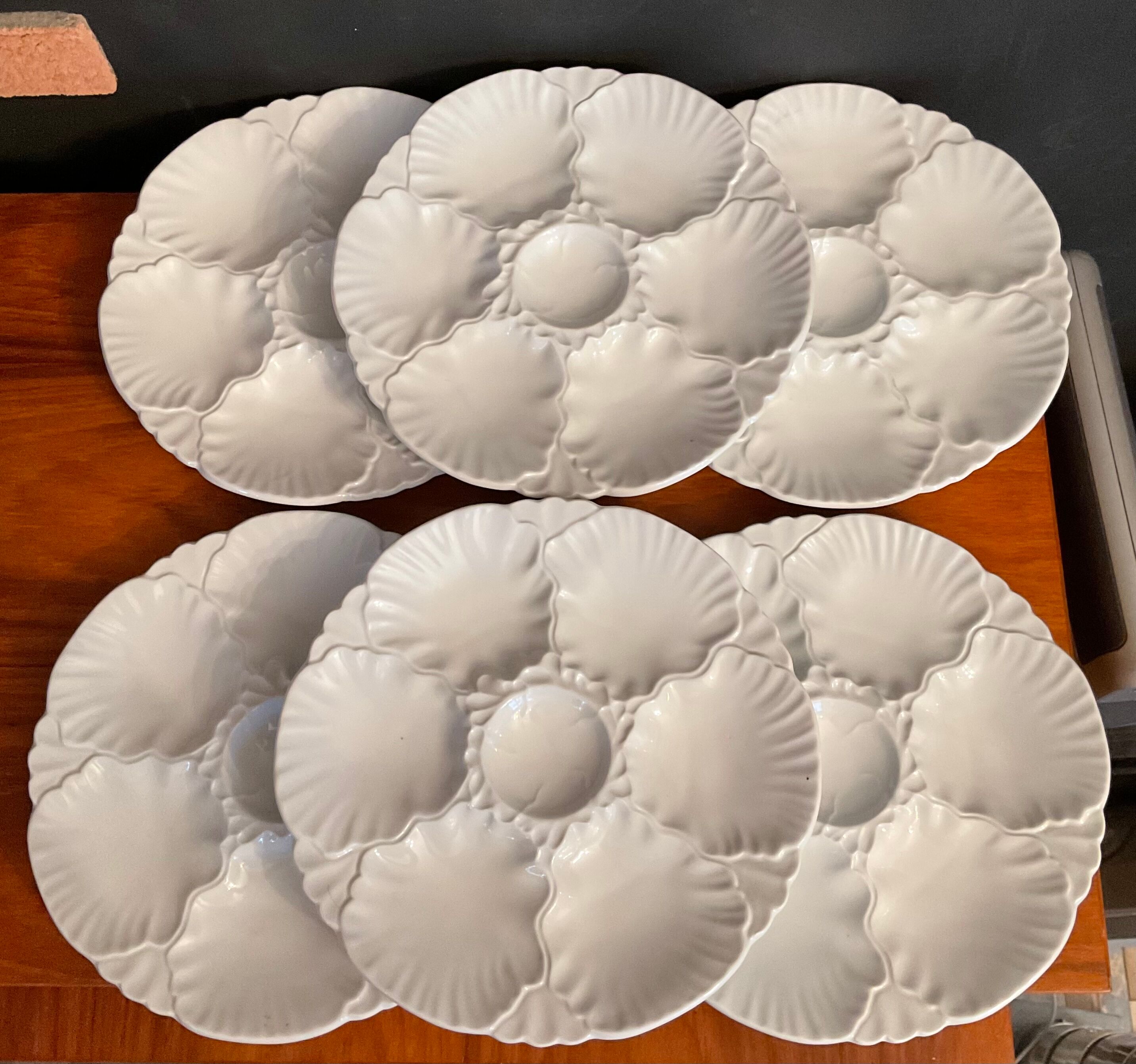 Series of 6 porcelain oyster plates