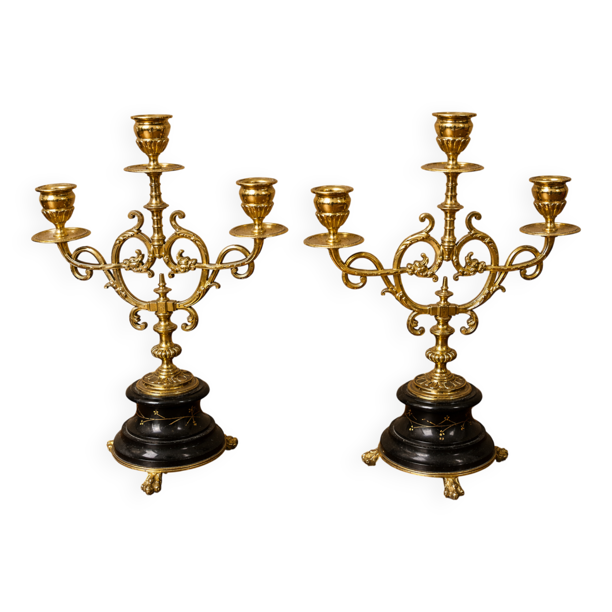 Elegant pair of three-light candelabra in gilded bronze.