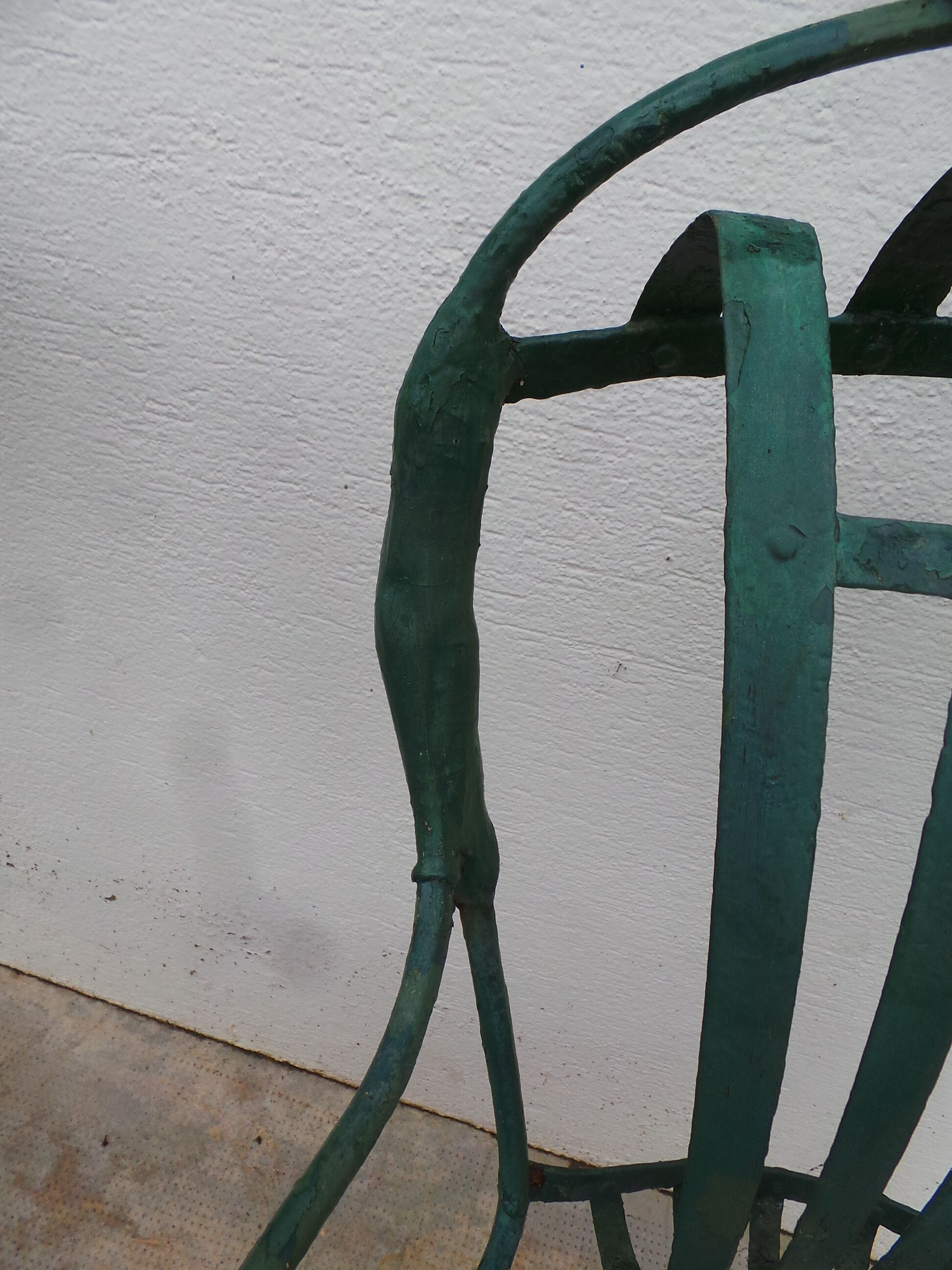 Pair of wrought iron garden chairs by François Carre