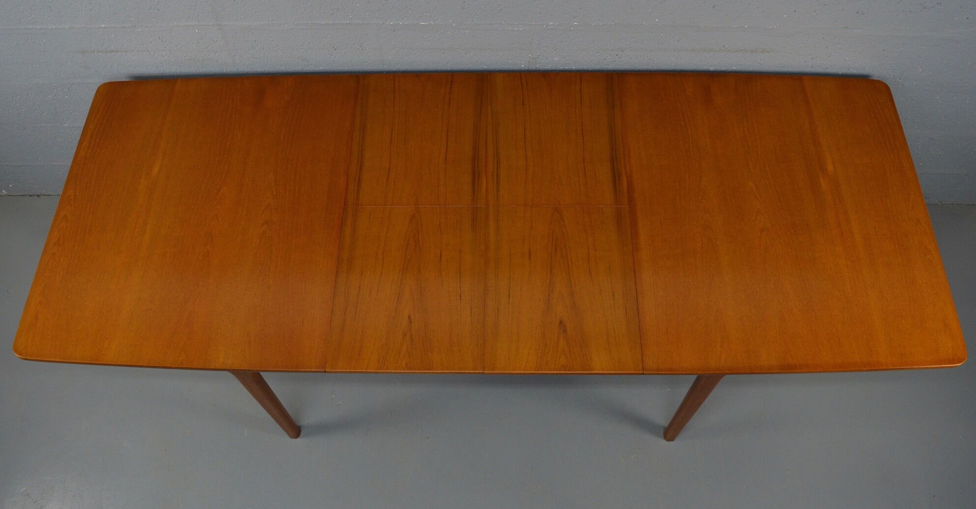 Extendable table by A.H. McIntosh