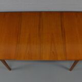 Extendable table by A.H. McIntosh