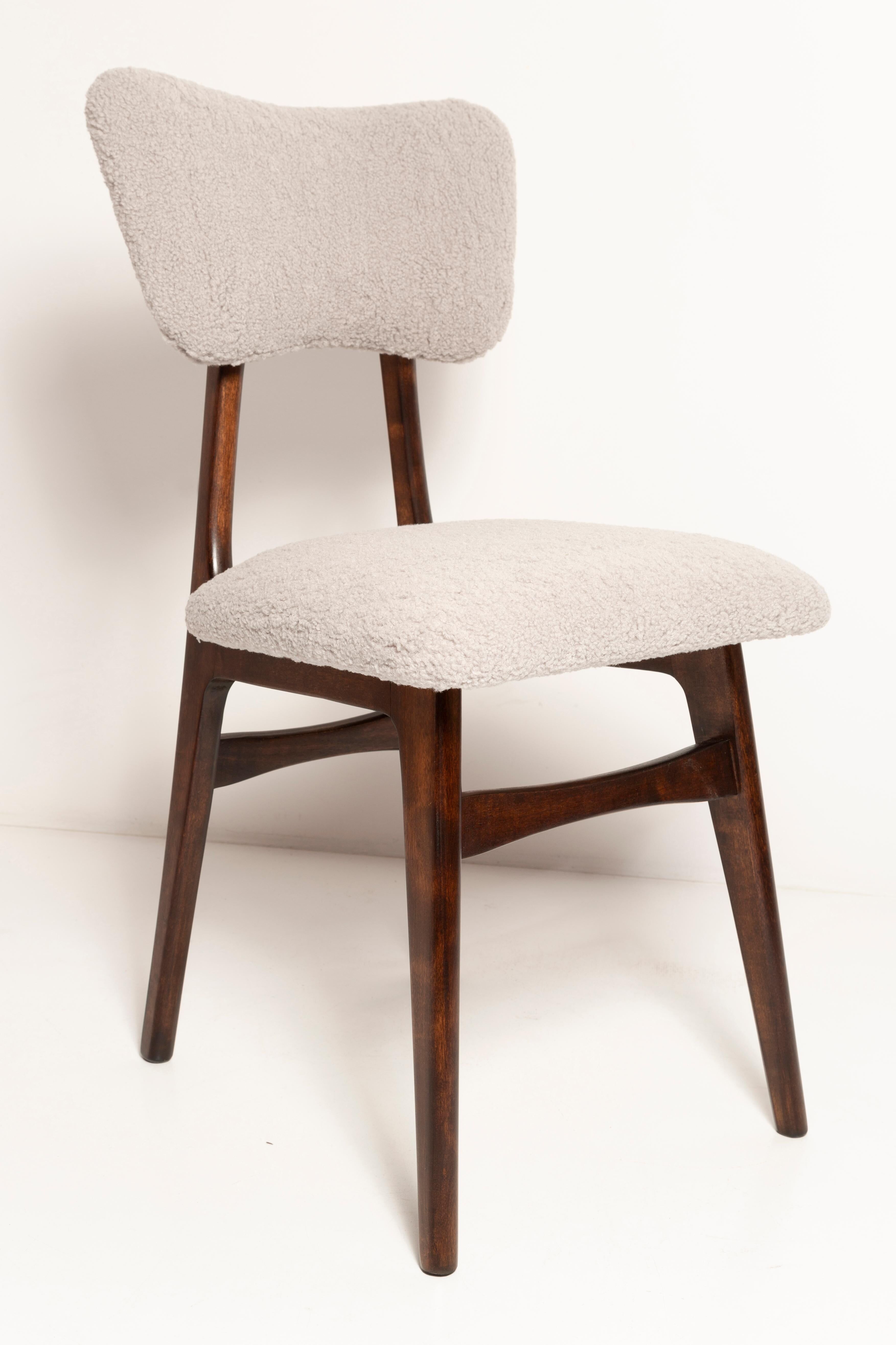 Mid-century butterfly chair, light grey boucle, dark walnut wood, Europe, 1960s.