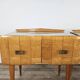 Mid-century nightstands in maple, brass, and glass
