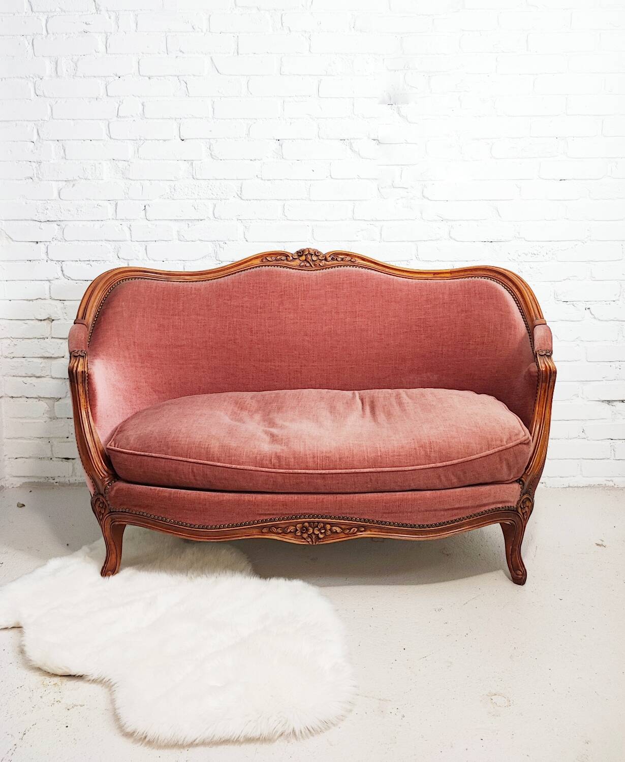 Pink velvet bench