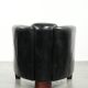 Black vintage cowhide aviator design armchair with characterful appearance