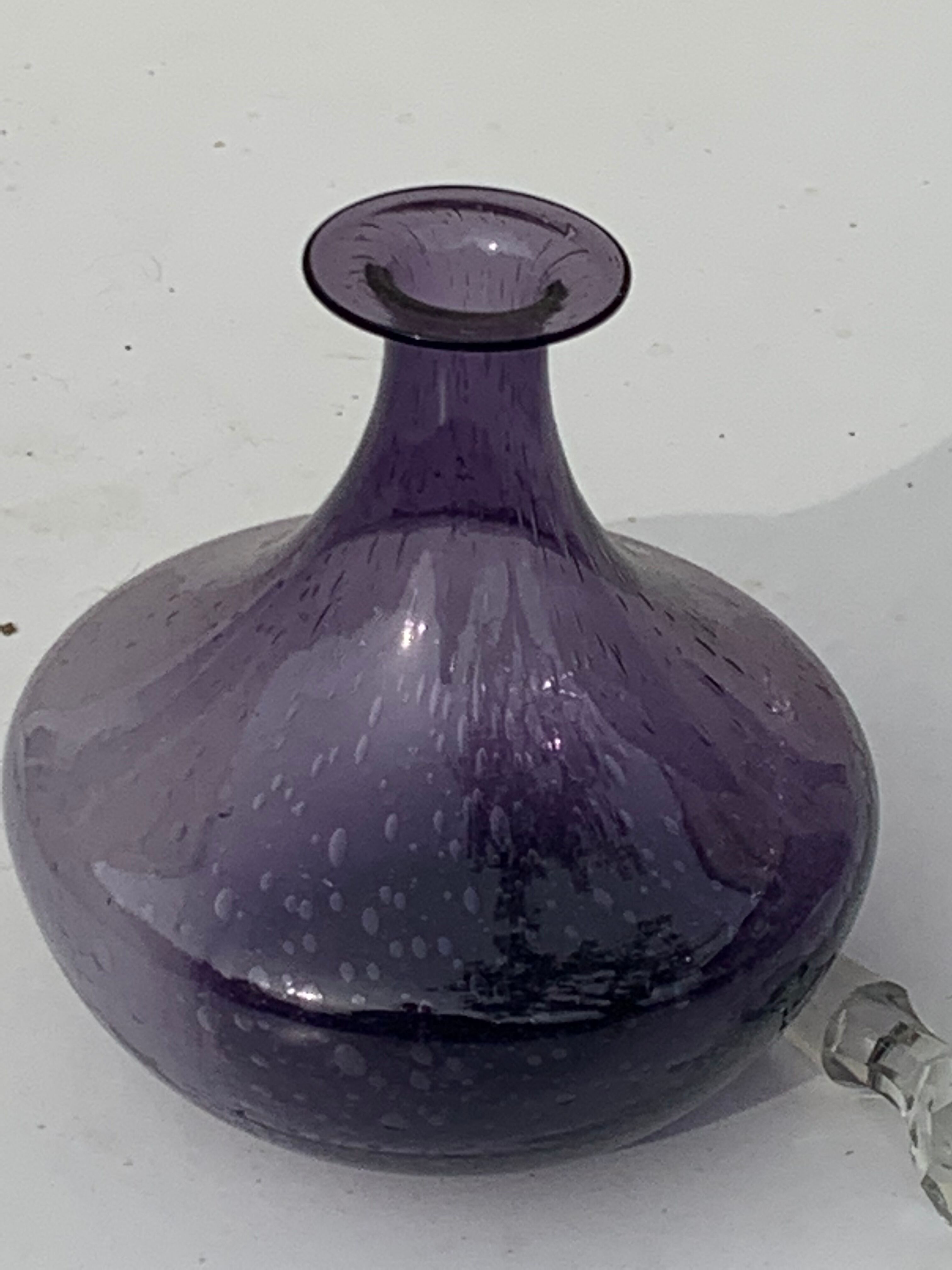 Bubble and purple blown glass decanter and faceted cut glass cap