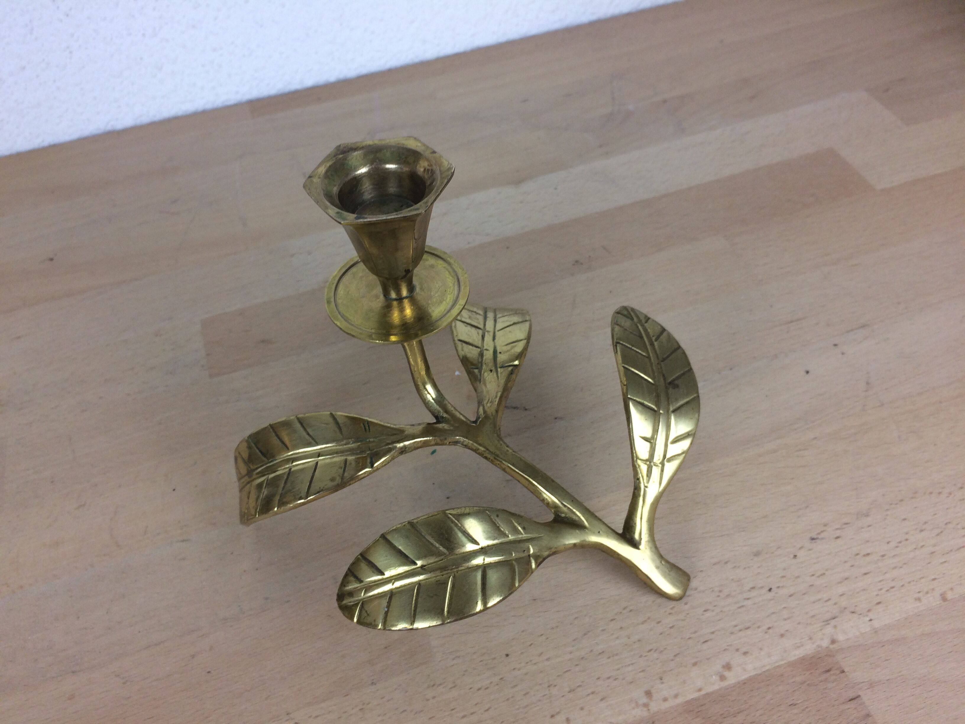 Candle holder flower leaves in golden brass