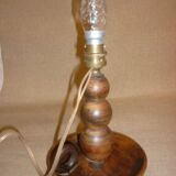 Turned wooden lamp base.