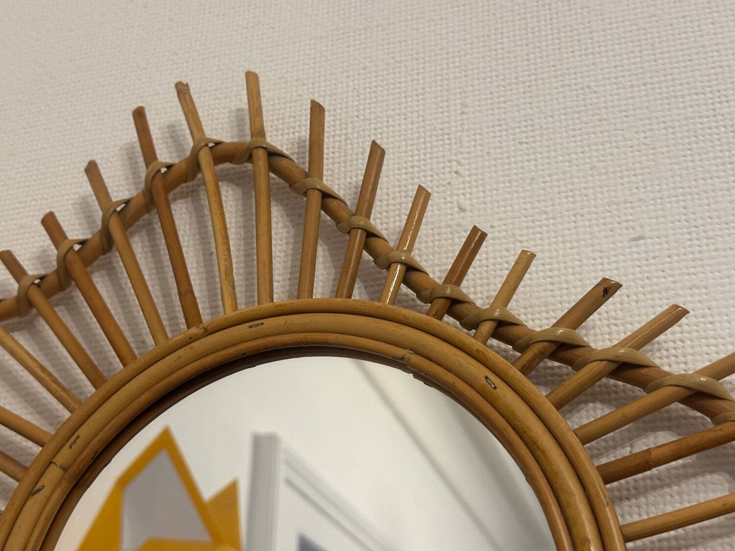 The vintage guitar rattan mirror.