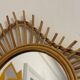 The vintage guitar rattan mirror.