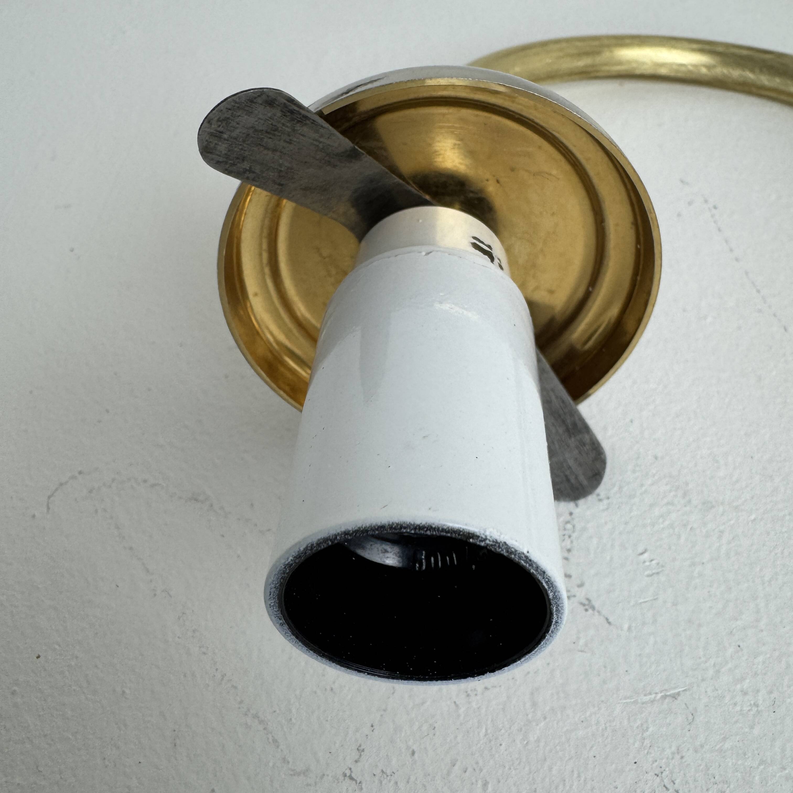 A pair of vintage opaline and brass wall lights