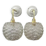 Pair of chiseled glass wall sconces