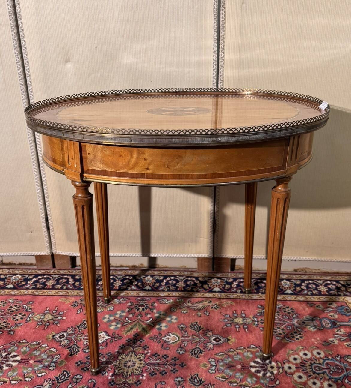 Louis XVI style bouillotte table in light wood and marquetry.