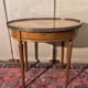 Louis XVI style bouillotte table in light wood and marquetry.
