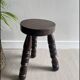 Wooden tripod stool