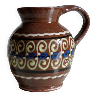 Small vintage enameled terracotta pitcher