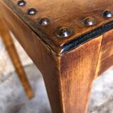 Pair of studded nesting tables and 1930