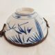 Asian bowl with metal frame imitating bamboo