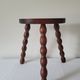 Brutalist stool turned wooden feet