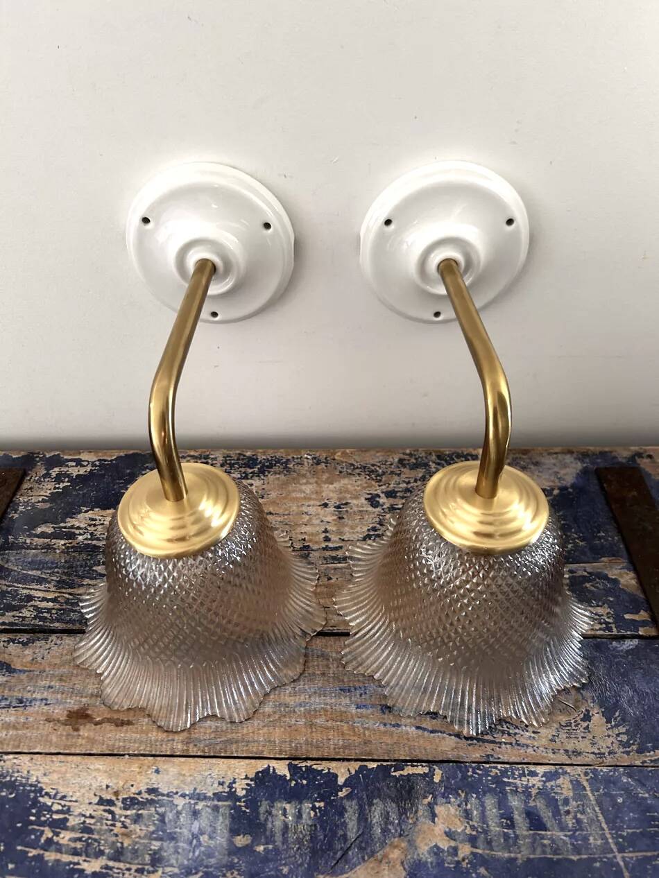 Pair of gold wall sconces