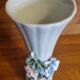 Porcelain vase with flowers in relief
