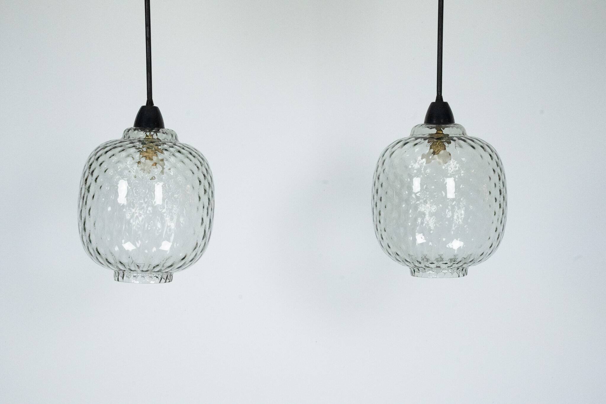 Pair of Mid-Century pendant lamps in smoked Murano glass, Italy, 1950s