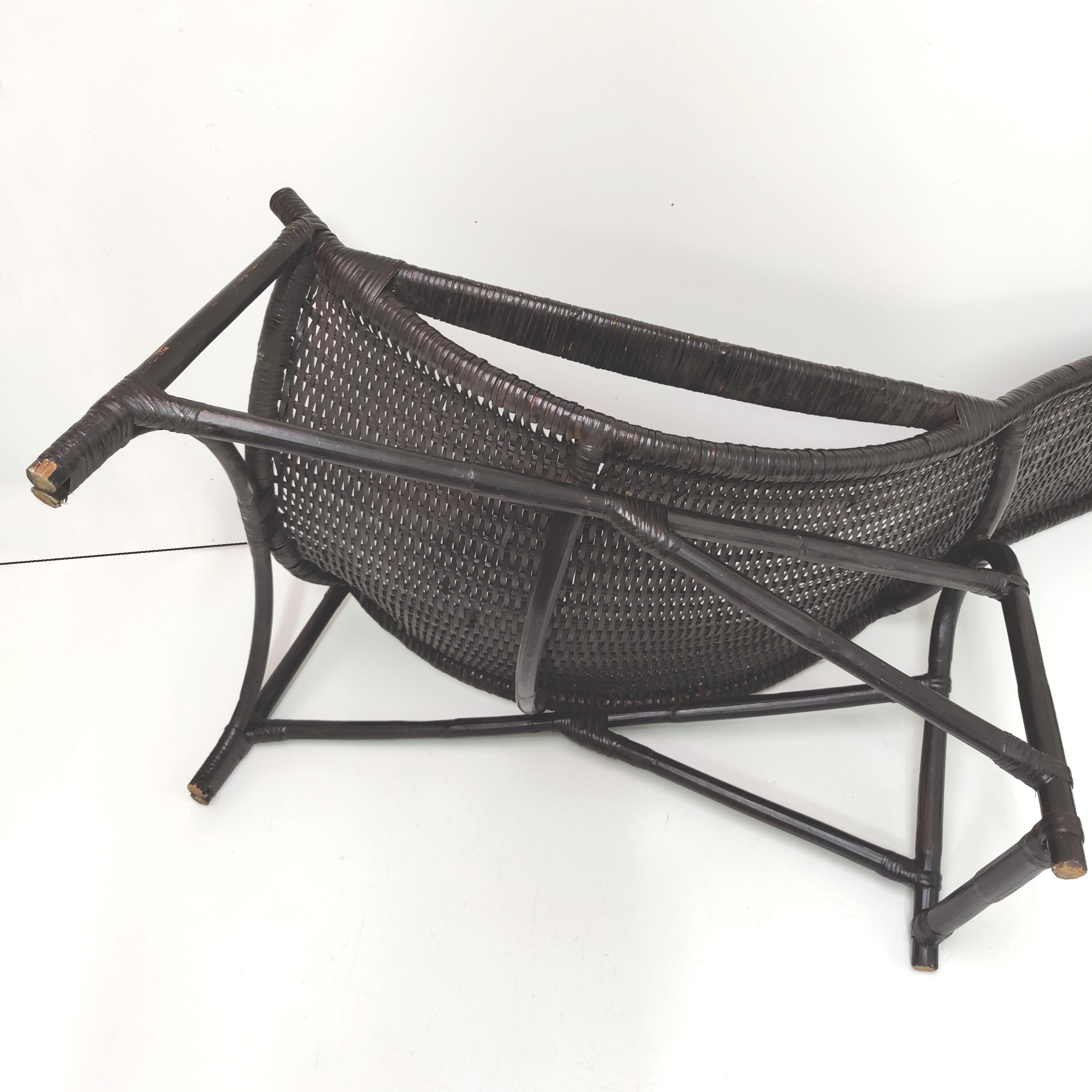 Vintage black rattan deck chair