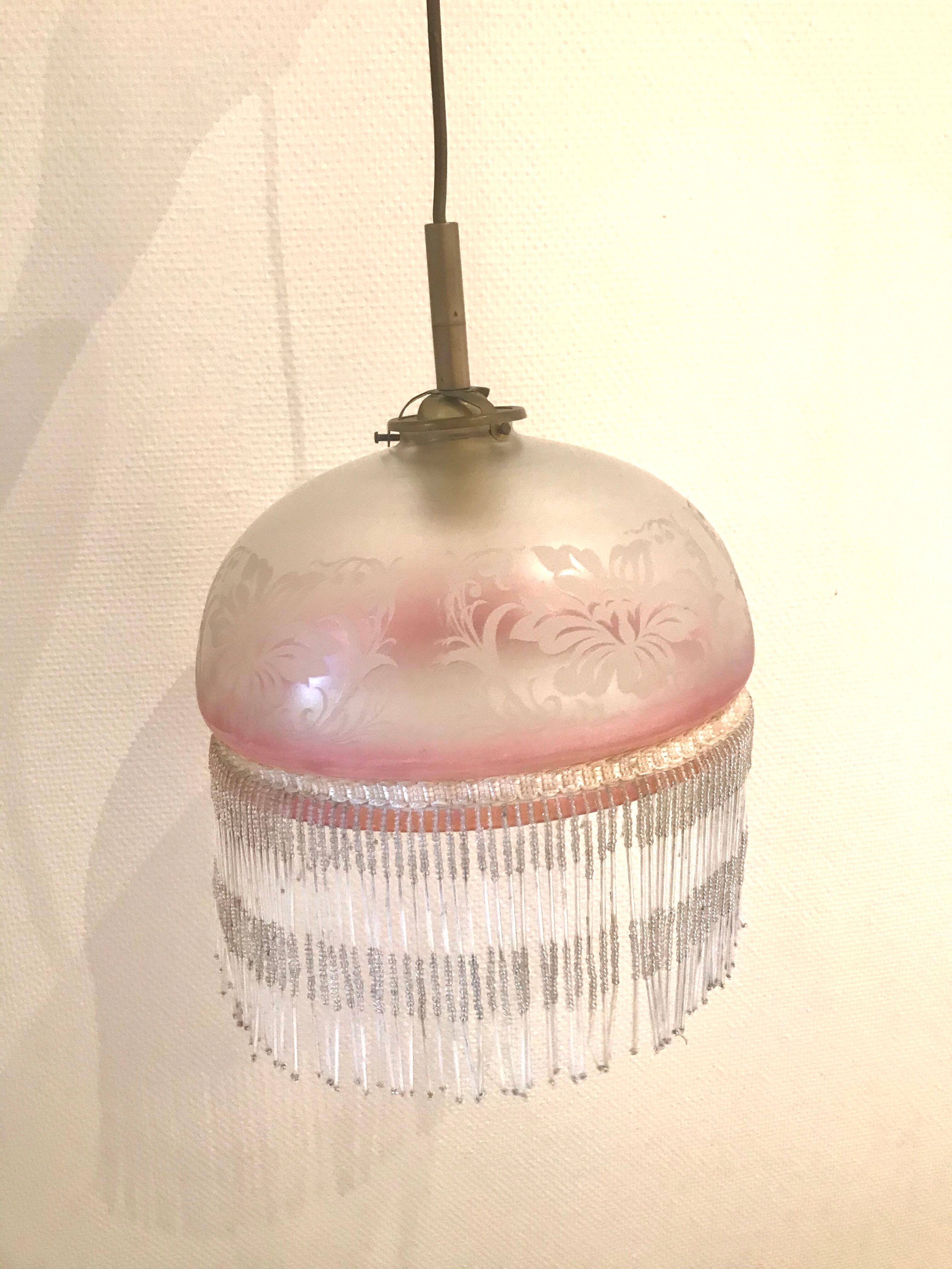 Hanging glass and stamps