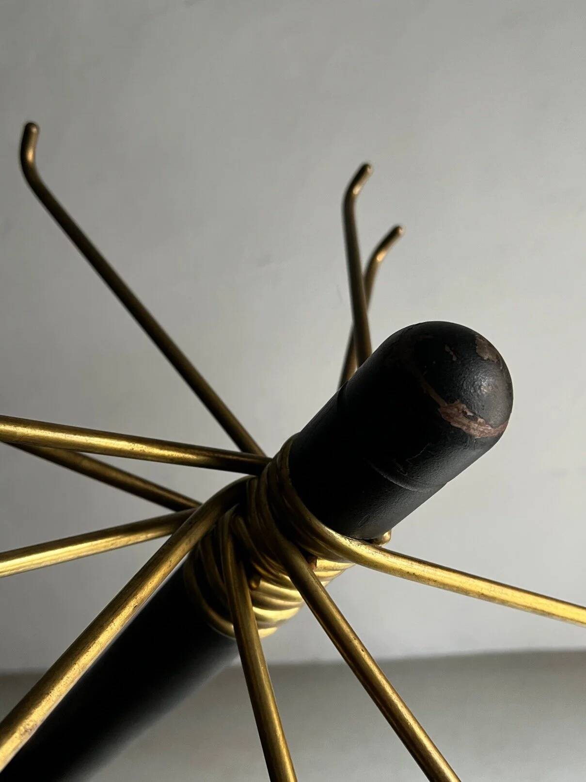 Minimalist black metal brass coat stand